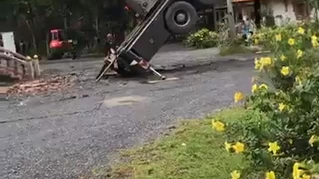 Crane Crushes Crematorium