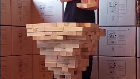 Most giant Jenga blocks stacked on one vertical: 500 by Aulden Maxwell