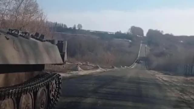 Local talks to Russian MT-LB crew, asks if they need a tow back home