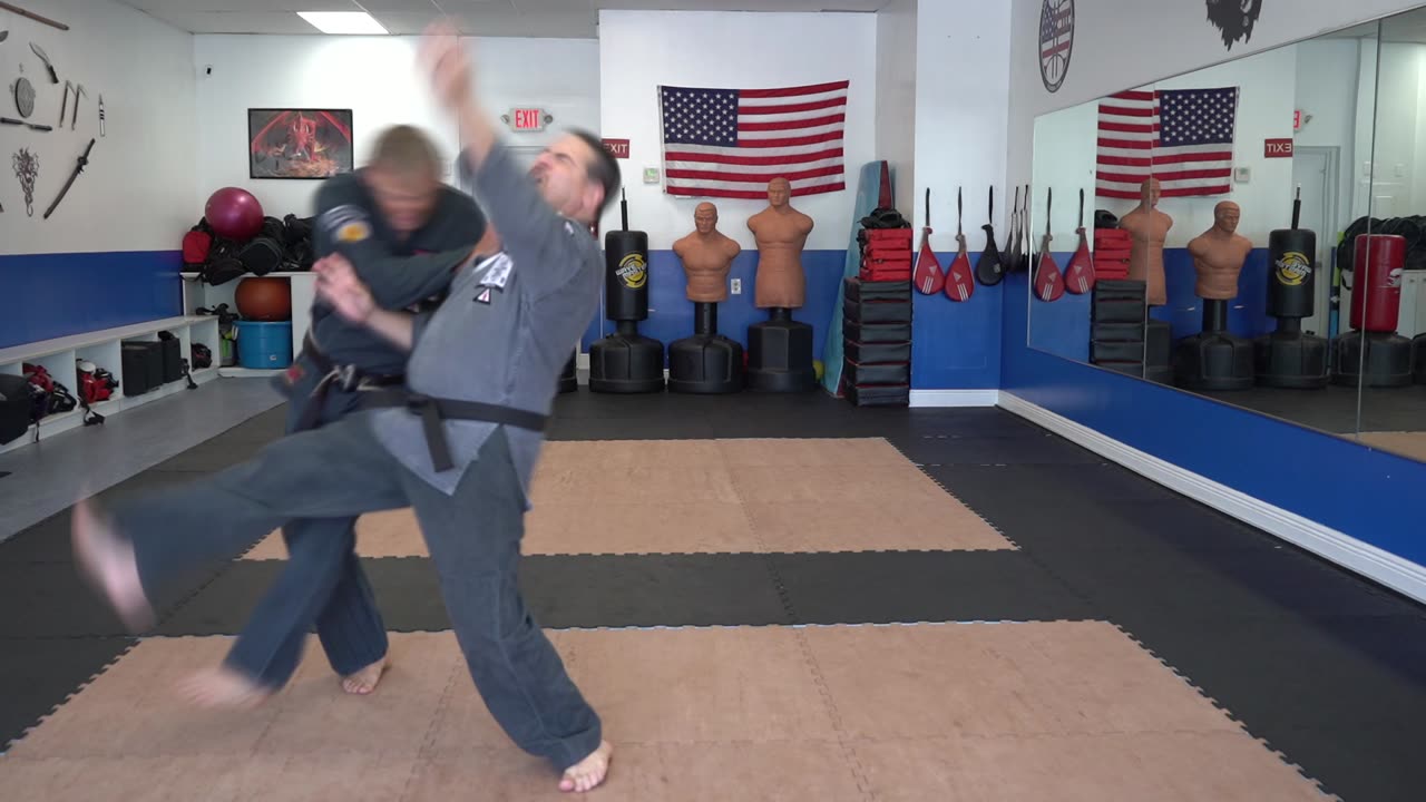 Executing the American Kenpo technique Destructive Fans