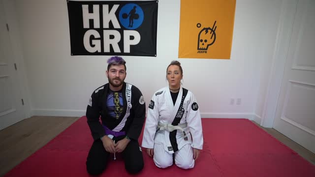 Boyfriend teaches girlfriend basic jiu jitsu techniques 3