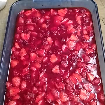 Cherry jello with fresh strawberries and raspberries