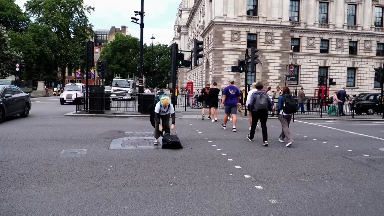 PARLIAMENT SQUARE PAINTED ORANGE IN CELEBRATION to stop fuel