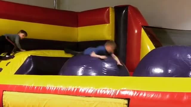 Blow up purple ball kid fail