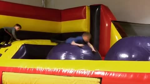 Blow up purple ball kid fail