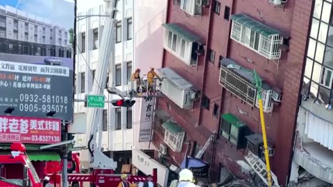 Building collapses on Taiwan street after quake