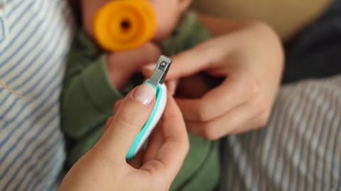 OMG How Cute! Mother Cutting Baby's Nail