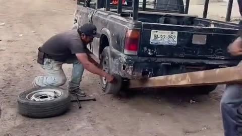 How to change a tire without a jack?