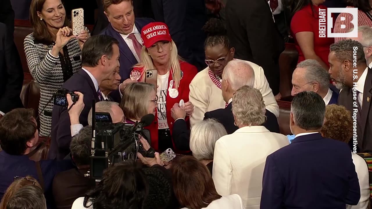 Rep. MTG Presents President Biden with "Say Her Name Laken Riley" Pin Ahead of SOTU Speech