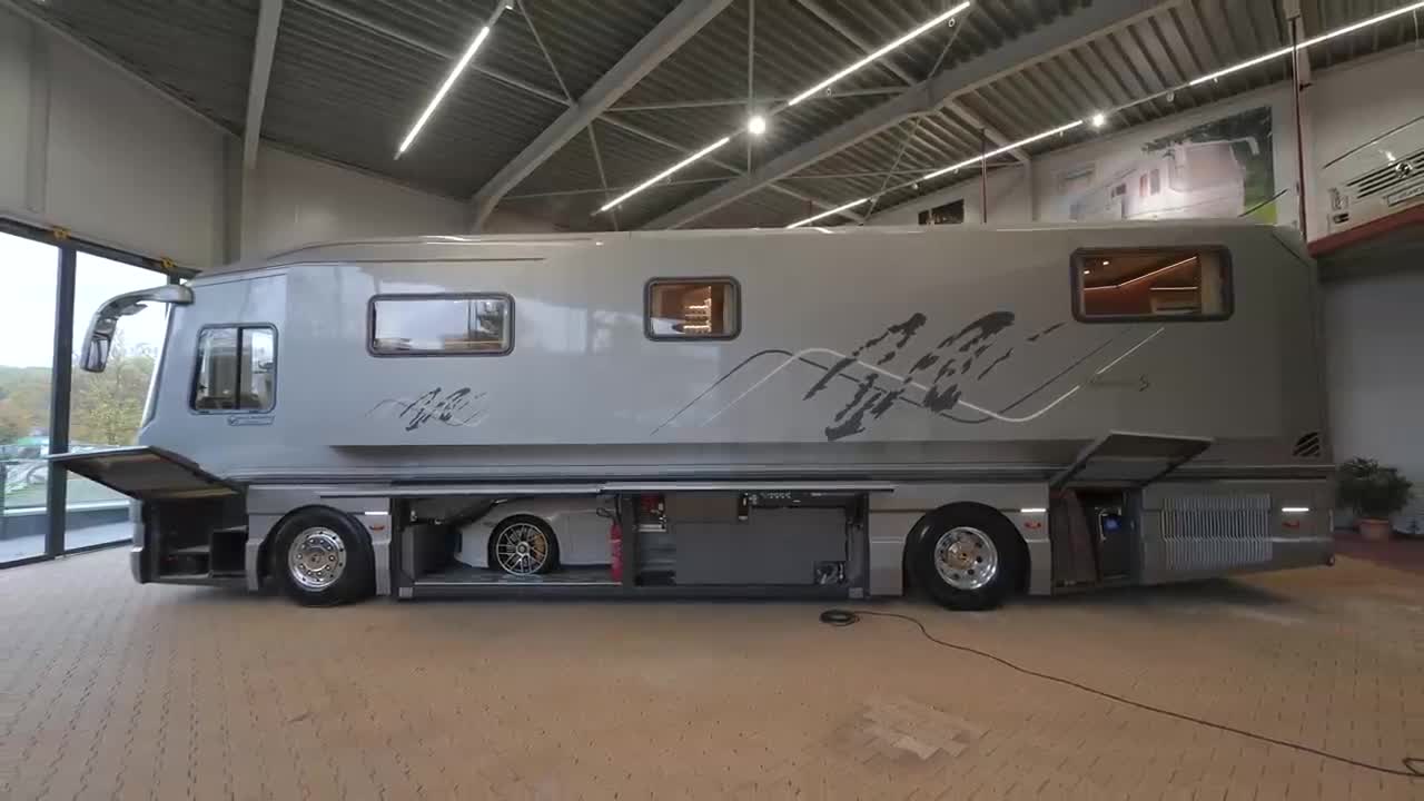 Touring a $2,000,000 Luxury Motorhome with hidden Supercar Garage