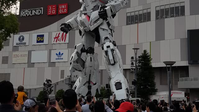 Opening ceremony for japan gundam statue in odaiba, tokyo