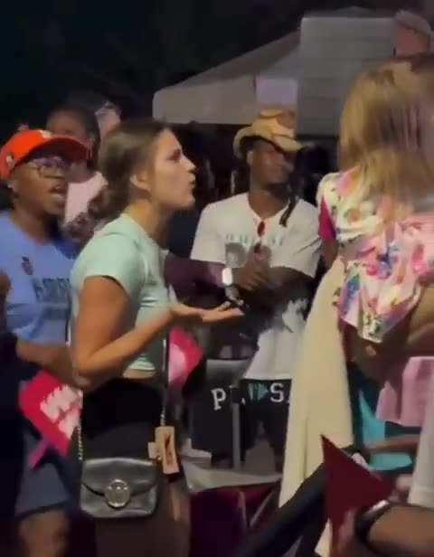 Kamala Harris supporter screams at little child in stroller