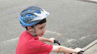 Spencer riding his bike VID_20180730_171213