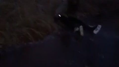 Girl in white ice skating falls down