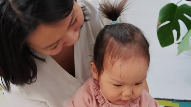 Mother taking selfie with kid