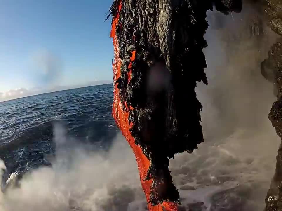 Amazing up close footage of Lava entering the ocean.