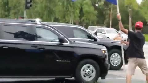 Man with Gigantic 'Trump 2024' Flag Ambushes Biden Motorcade in CA