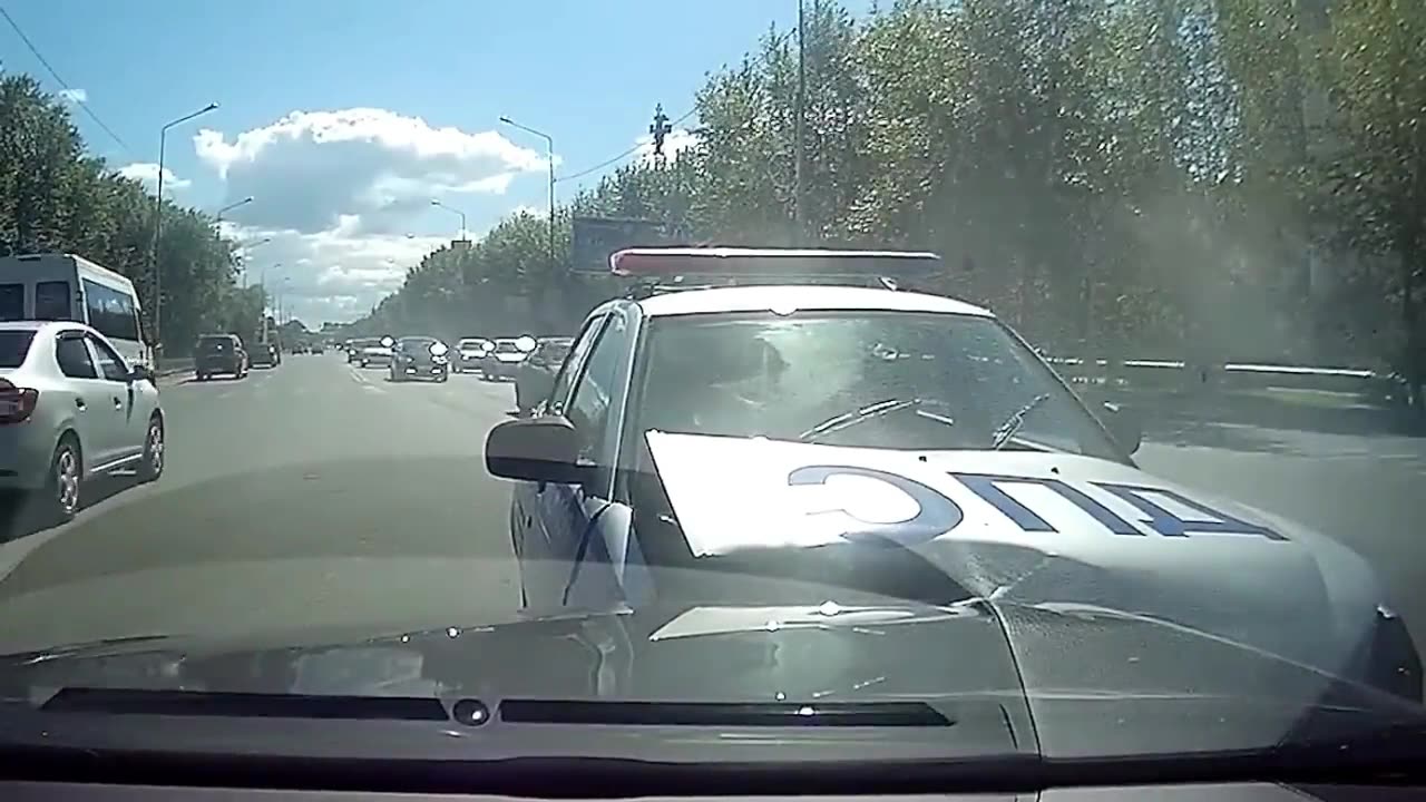 Speeding Police Officer Head_On Crashes into Car at Intersection