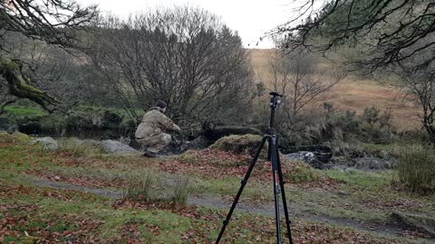 Using the Go pro to film the river . Wildcamping