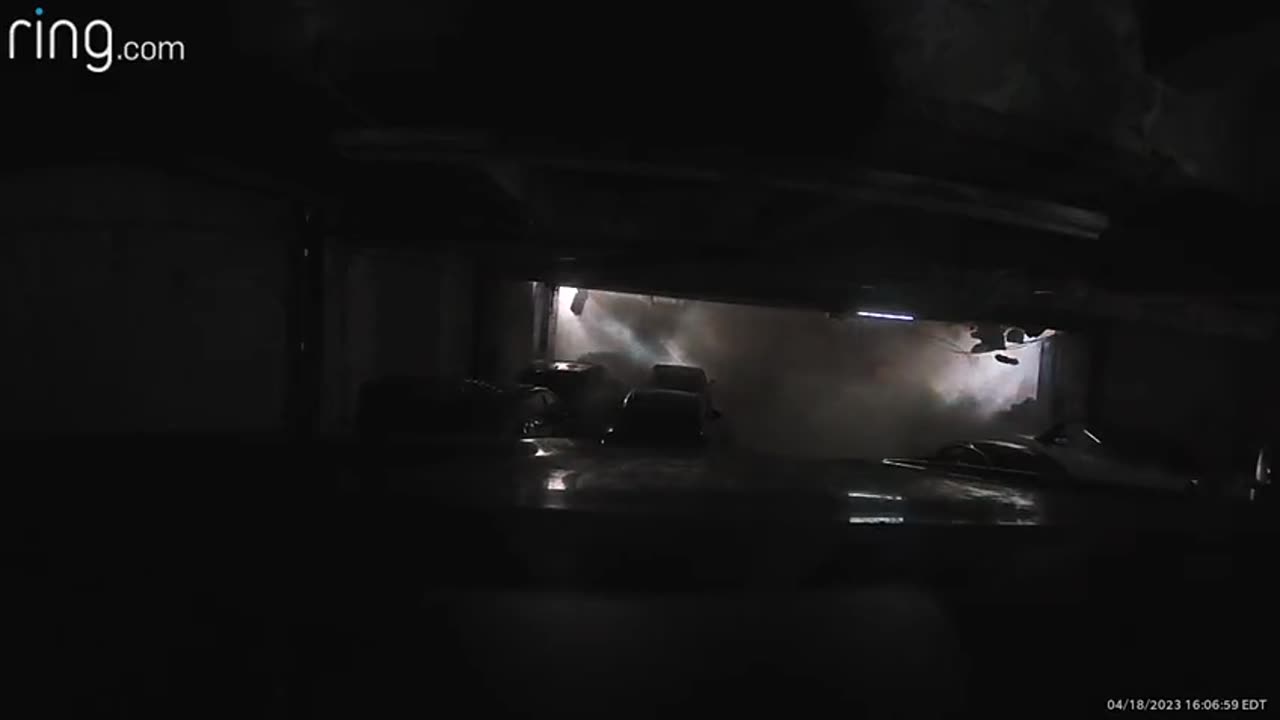 Video footage of NYC parking garage collapse from a car inside the garage