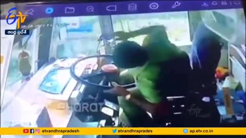 Another one spinning and looking up over his shoulder as he drives with phone in hand
