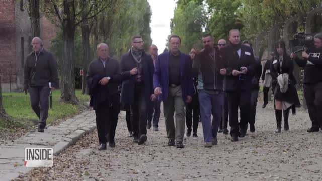 Arnold Schwarzenegger Pays Respects at Auschwitz