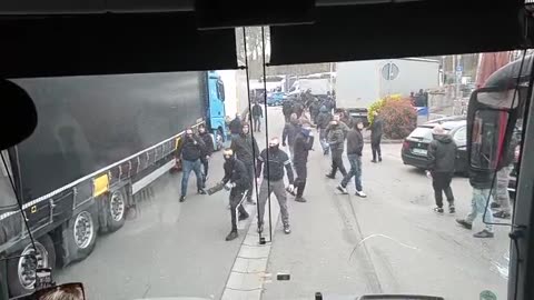Hooligans attacks rival fans at rest area.