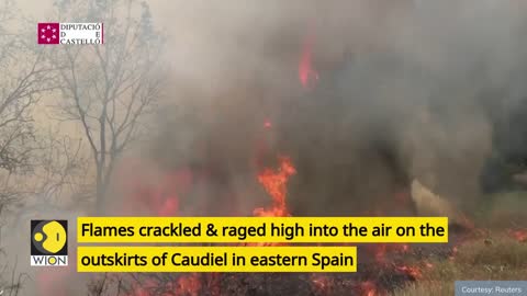 Spain battles to stop raging wildfire