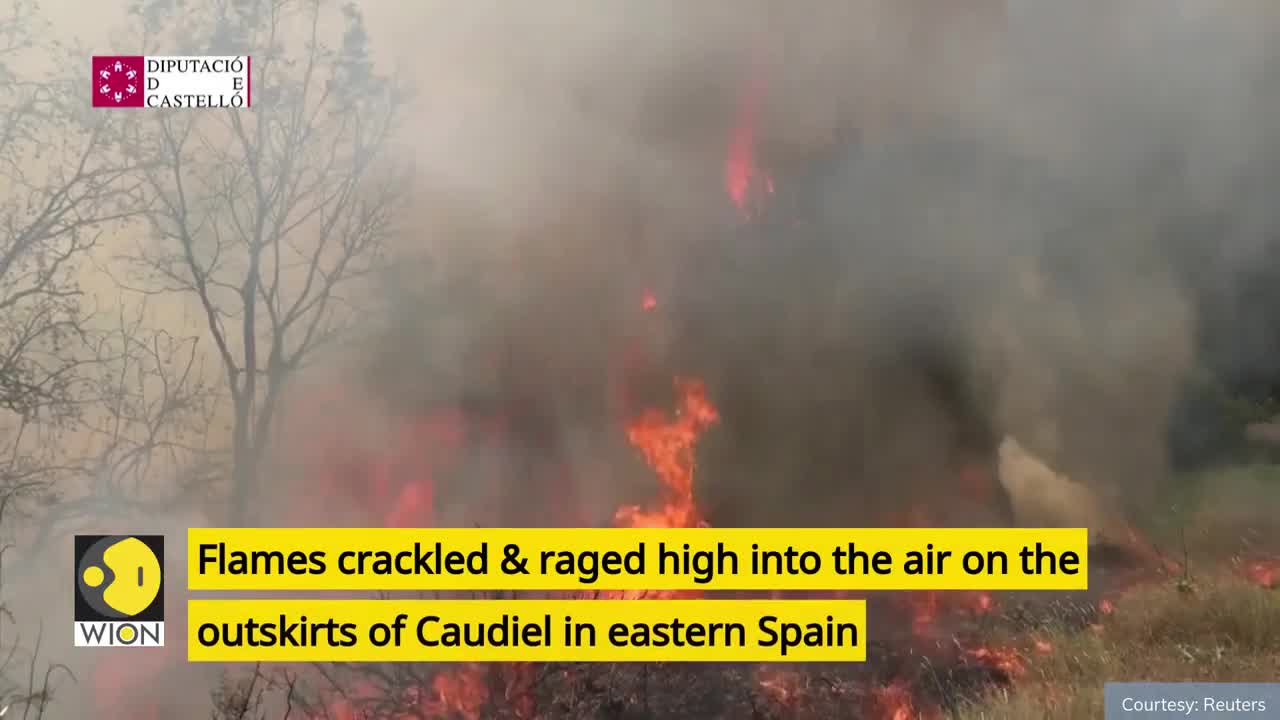 Spain battles to stop raging wildfire