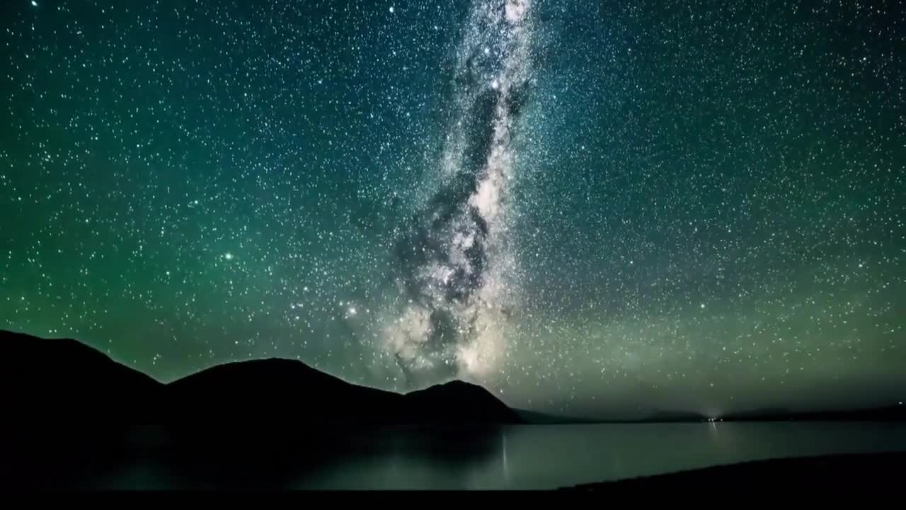 amazing Timelapse of the Night Sky with Reflections in a Lake