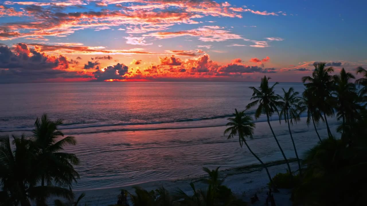 Bright orange sunset on beach