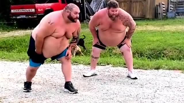 Two fat people in action