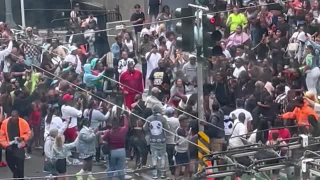 Man Twerks at Pride While a Fight Breaks Out Nearby