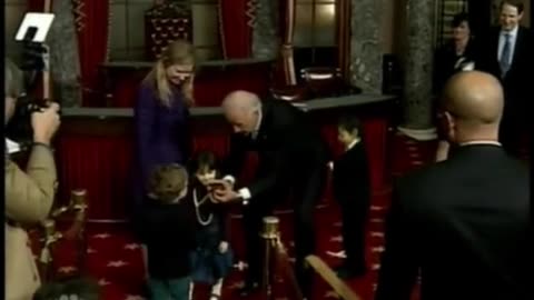 Biden getting pick pocketed by a child