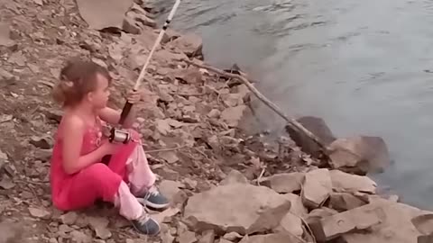 Little Girl Catches Fish Bigger Than Her