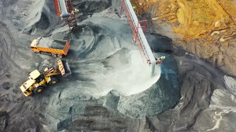 4K Aerial Drone View of Industrial Vehicle Loading at the Factory