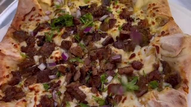 Would you eat this cheesy Carne Asada Pizza Got this delicious pizza from