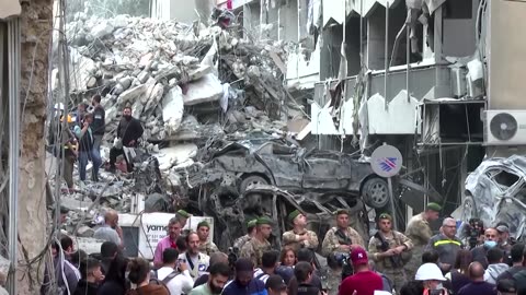 Workers clear rubble after deadly Israeli strike in Beirut