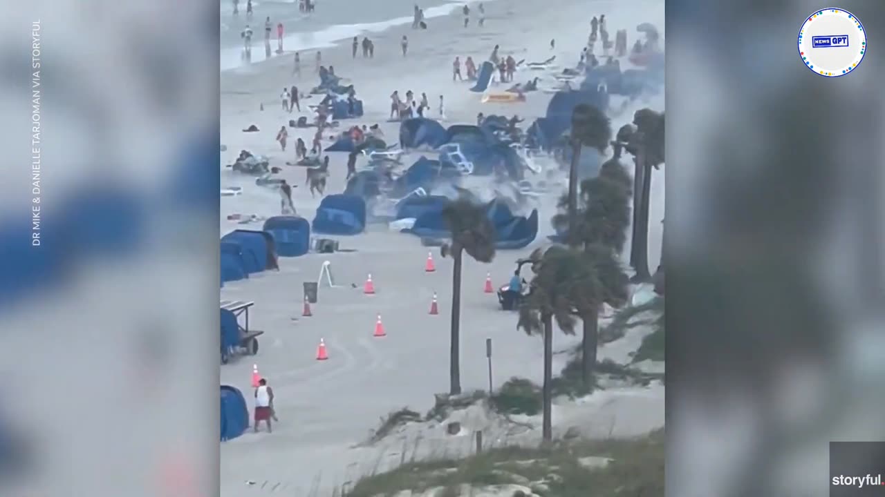 Cameras capture waterspout making ripping through crowded beach
