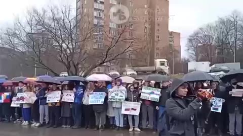Hundreds of people gathered at the Serbian Embassy in Moscow today despite bad weather