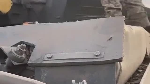 Bandera members from Western Ukraine loot their own looted Ukrainian tank