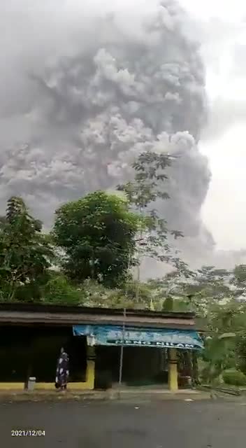 Indonesia's Mount Semeru volcano in East Java erupts sending ash 40,000ft into the sky