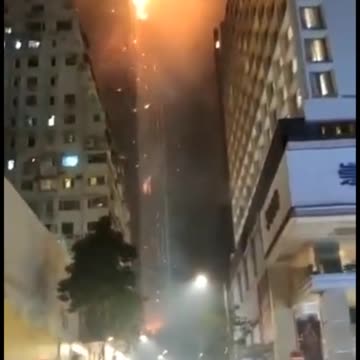 Towering Inferno In Hong Kong, Skyscraper Under Construction Consumed In Flames