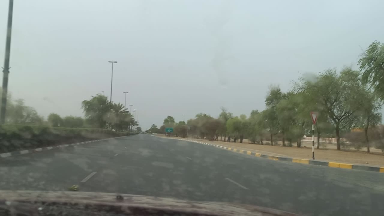 Abu Dhabhi Al ain rainy and dusty day