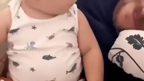 The baby's reaction is amazing