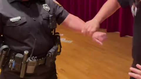 Magician steals police officers watch