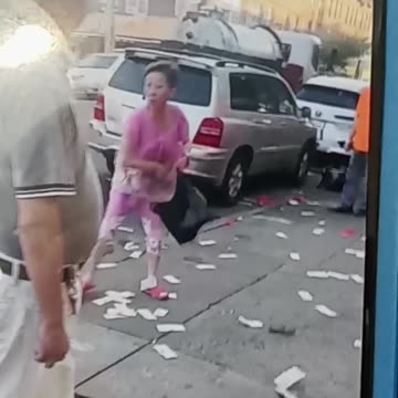 Crazy woman gives away money