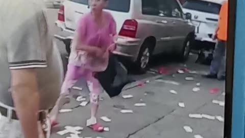 Crazy woman gives away money