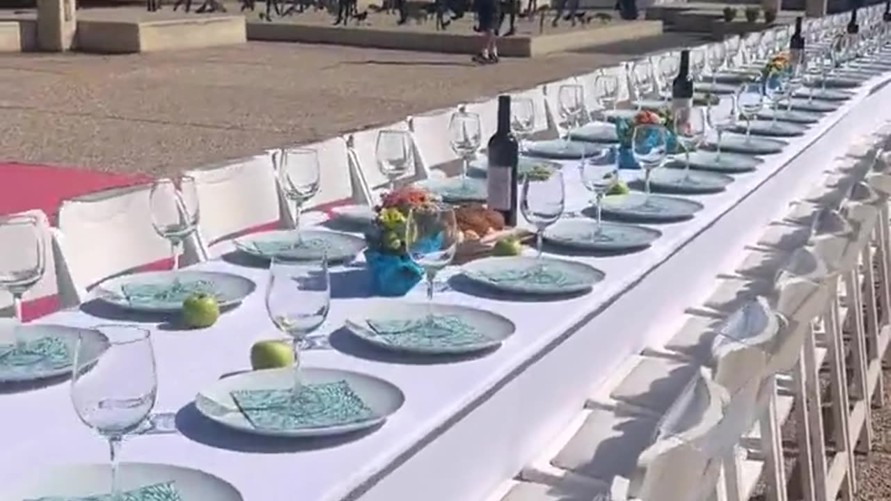 Outside the Tel Aviv museum, a Shabbat table is set for 203 hostages kidnapped