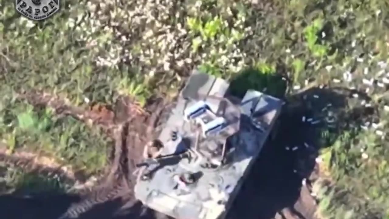 Russians Bail As a Ukrainian Drone Squares Up on Russian APC